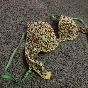 Lime green Victoria’s Secret push-up bra with a floral cheetah print design
